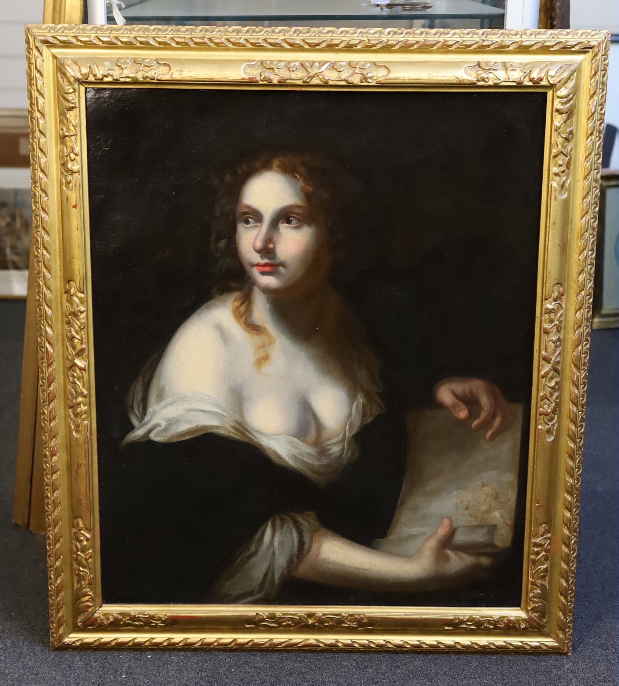 18th century English School , Portrait of a woman holding an Old Master drawing, oil on canvas, 74 x 61cm